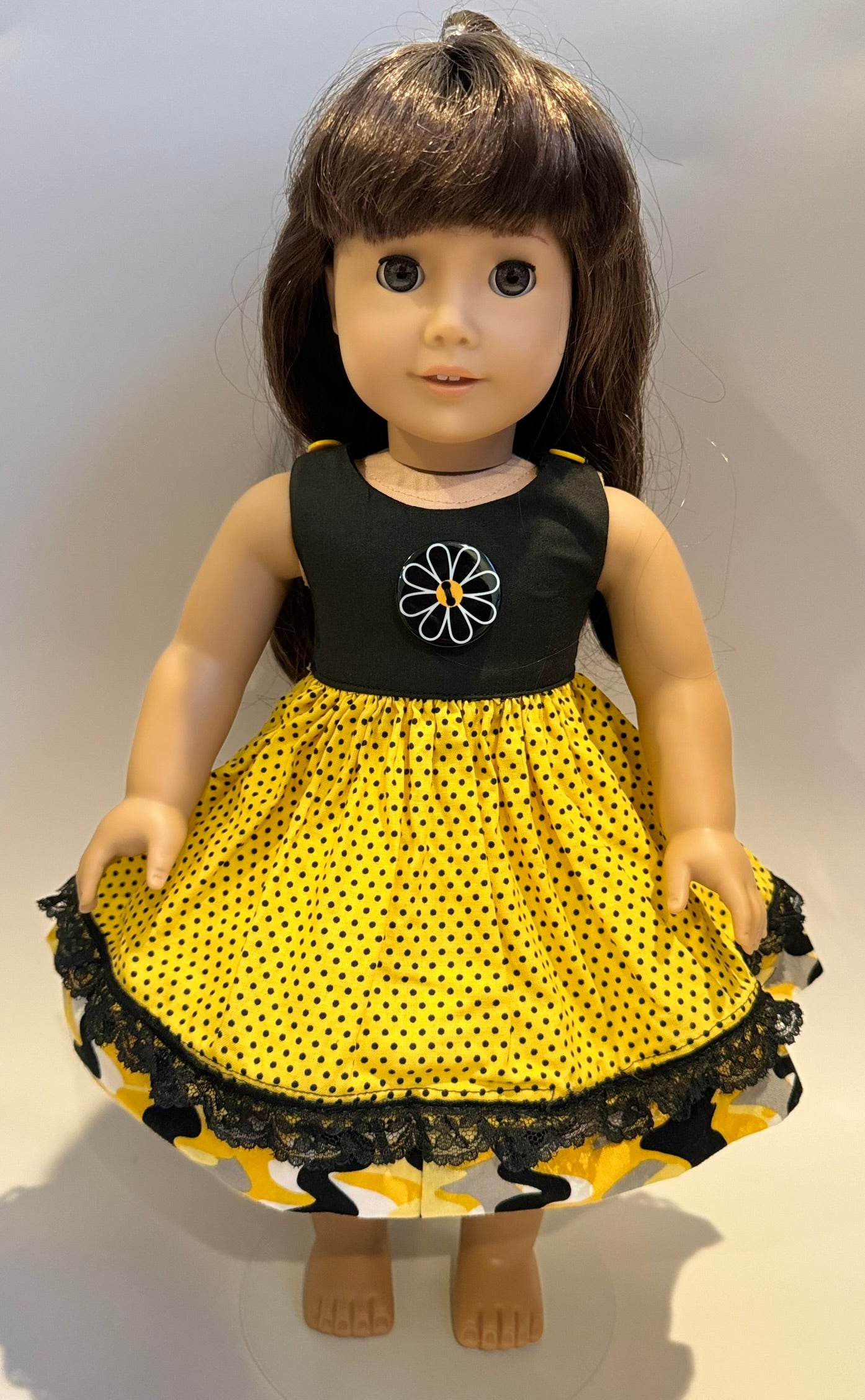 Dress made by Kathleen Saviak: black and yellow daisy polkadot