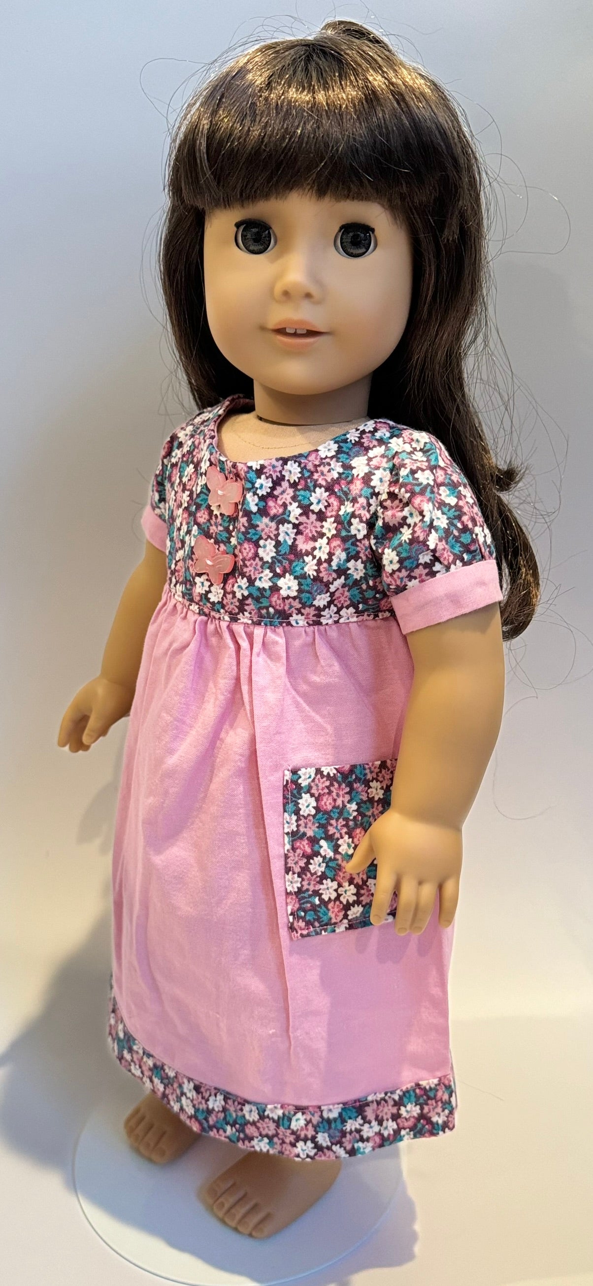 Dress made by Kathleen Saviak: pink floral with pockets and butterfly buttons