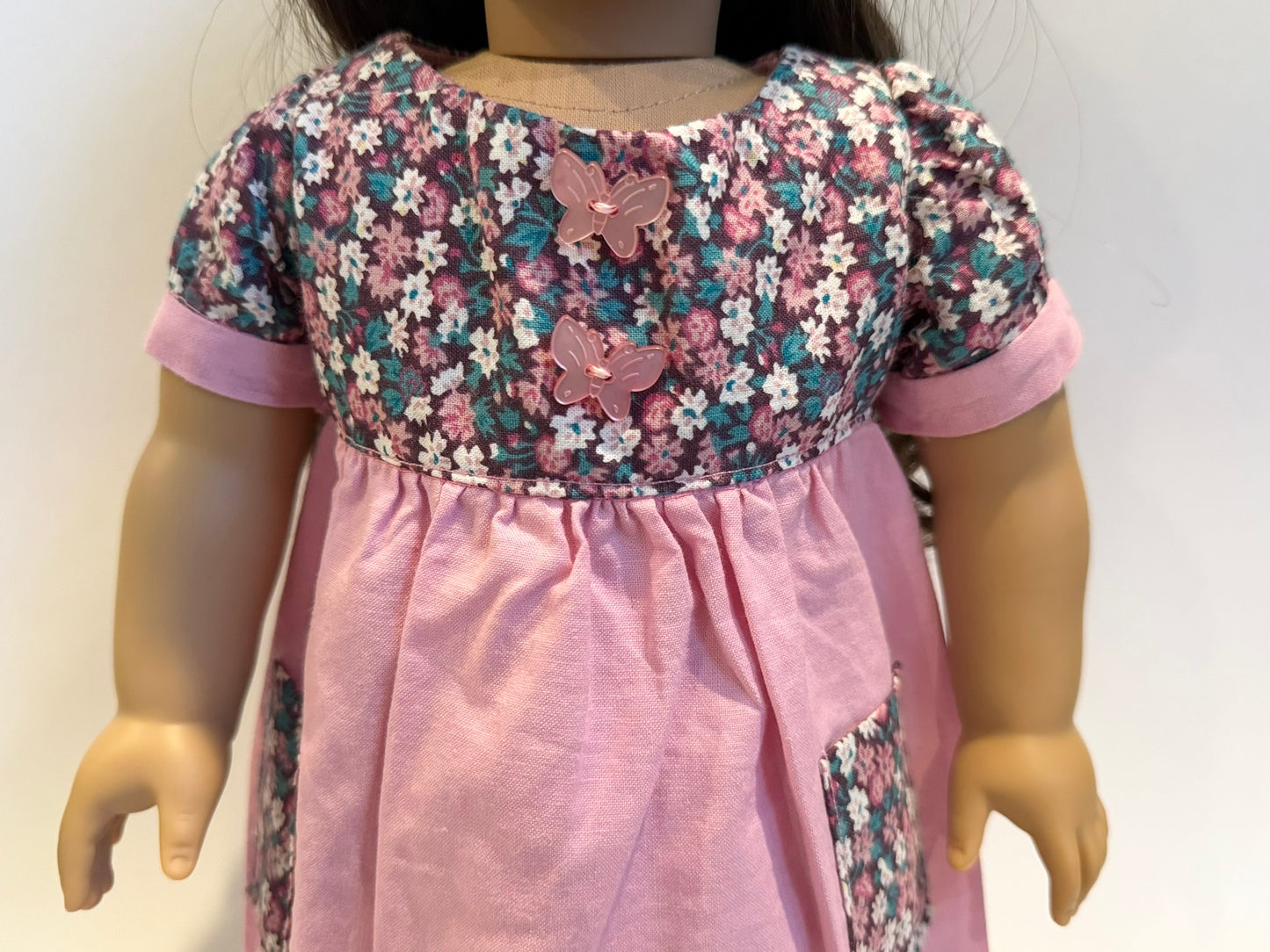 Dress made by Kathleen Saviak: pink floral with pockets and butterfly buttons