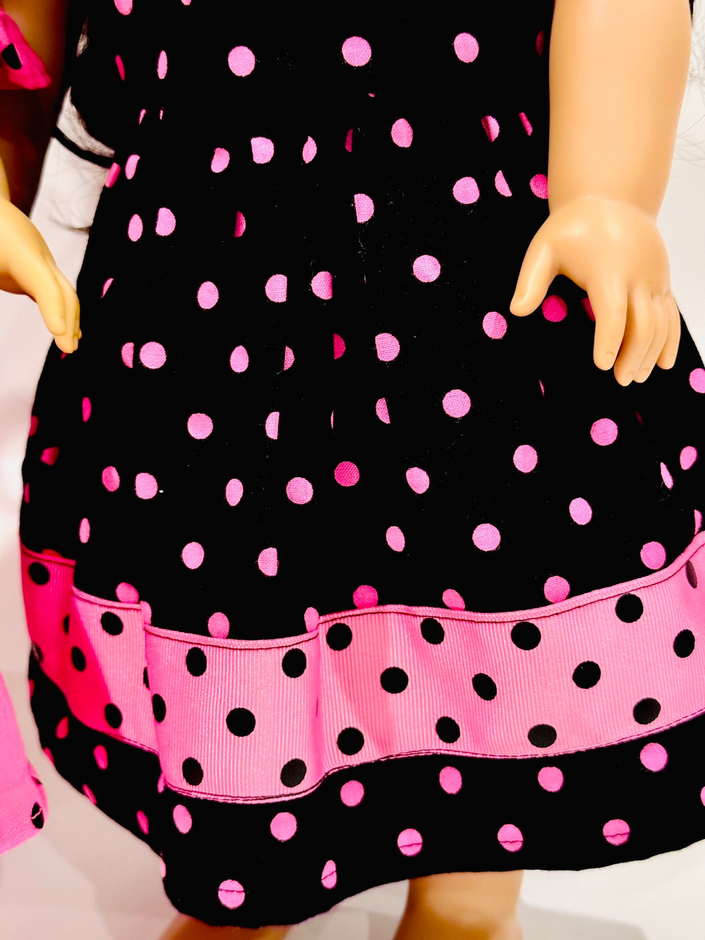 Pink and black polkadot set made by Kathleen Saviak
