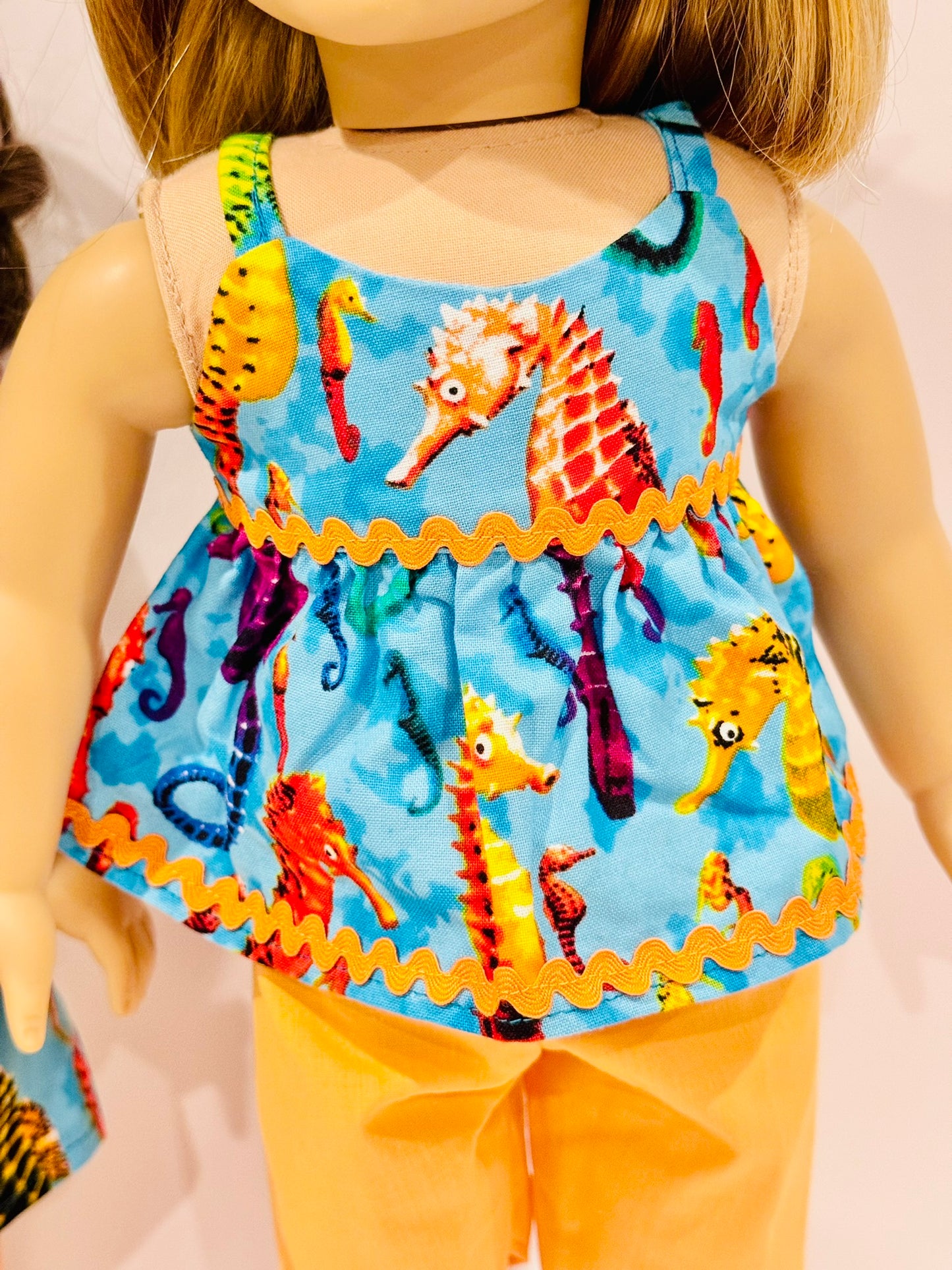 Orange and blue seahorse set made by Kathleen Saviak