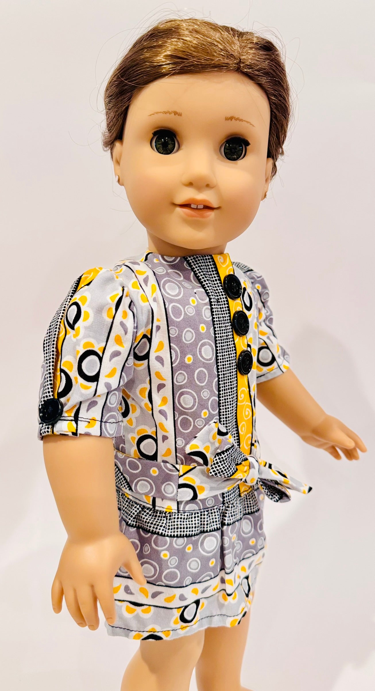Dress made by Kathleen Saviak: whimsical yellow, gray, black, and white