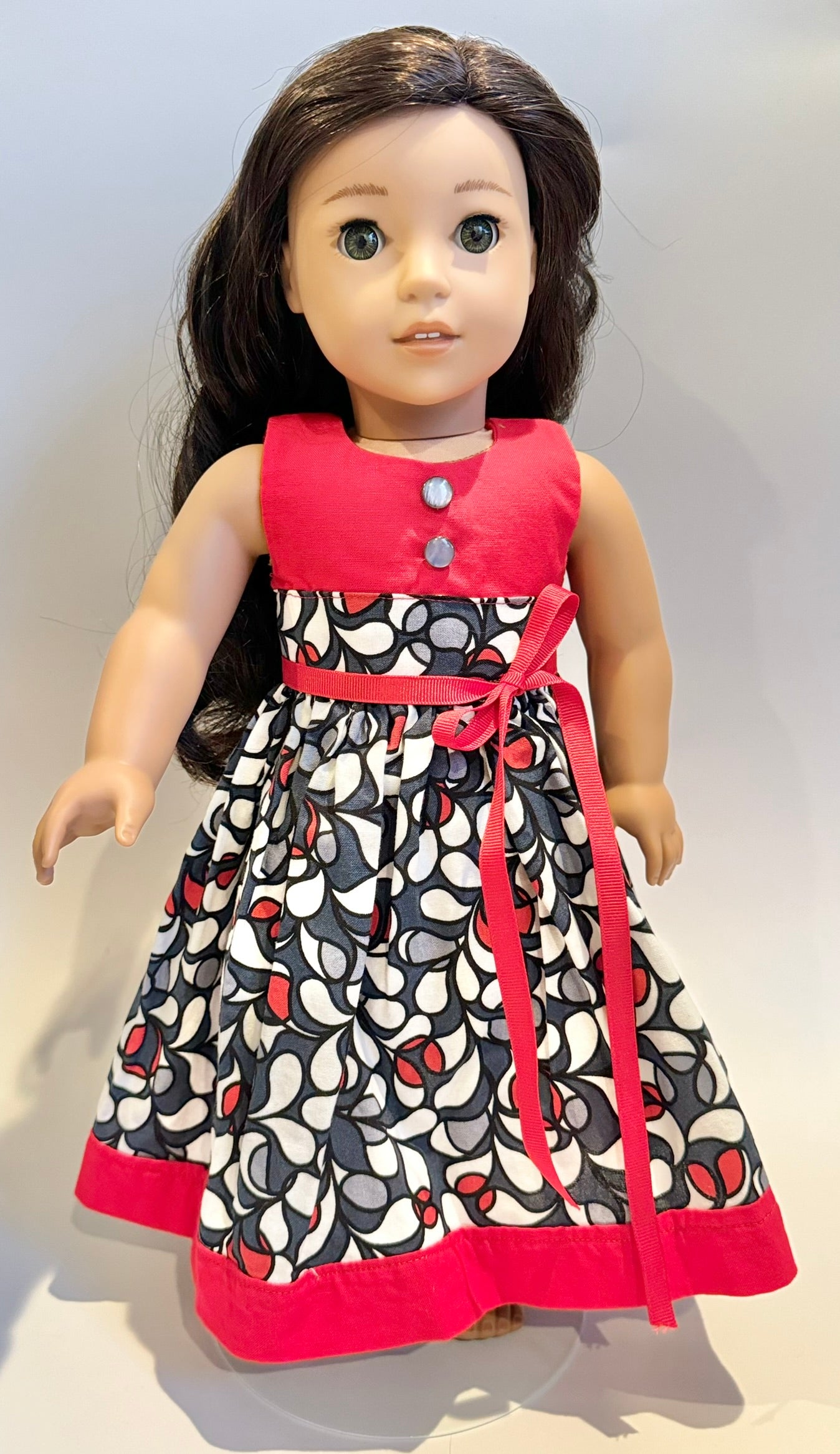Dress made by Kathleen Saviak: whimsical red, gray, and white sleeveless