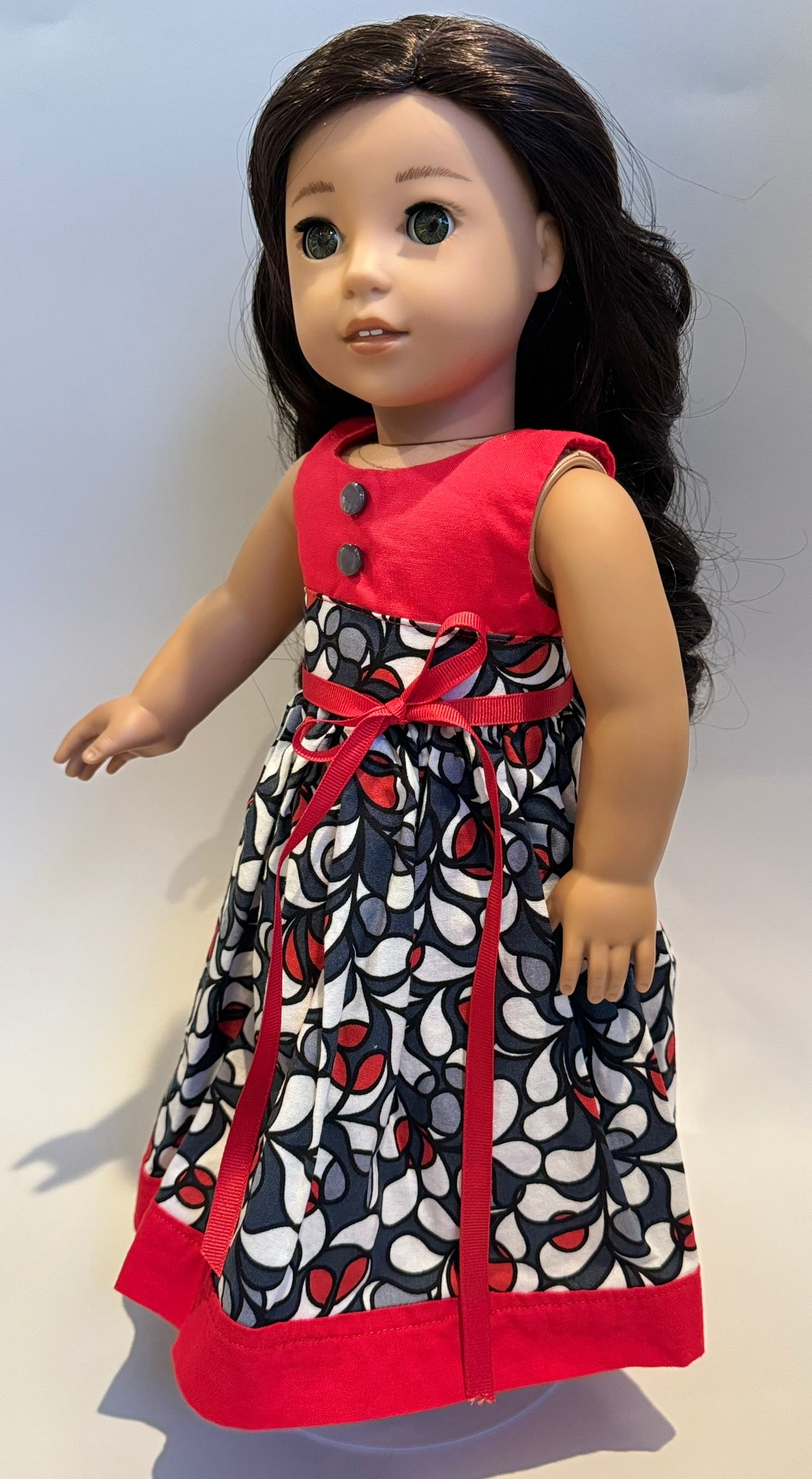 Dress made by Kathleen Saviak: whimsical red, gray, and white sleeveless