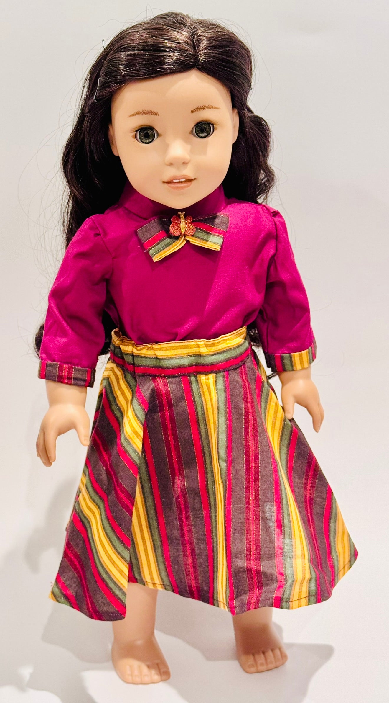 2-piece outfit made by Kathleen Saviak: fall tones "flapper" skirt and long-sleeve top with butterfly bow