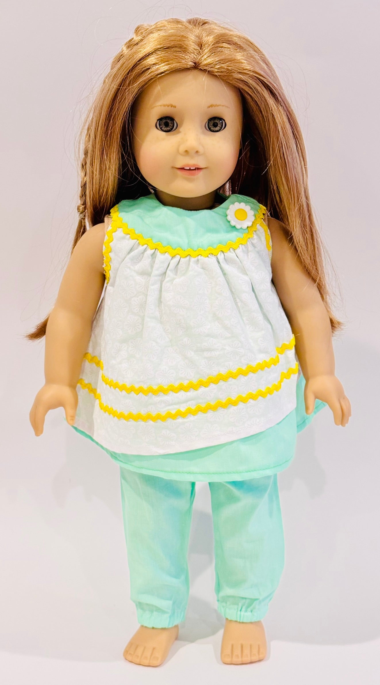 2-piece outfit made by Kathleen Saviak: mint green flowy and flowery top and slacks