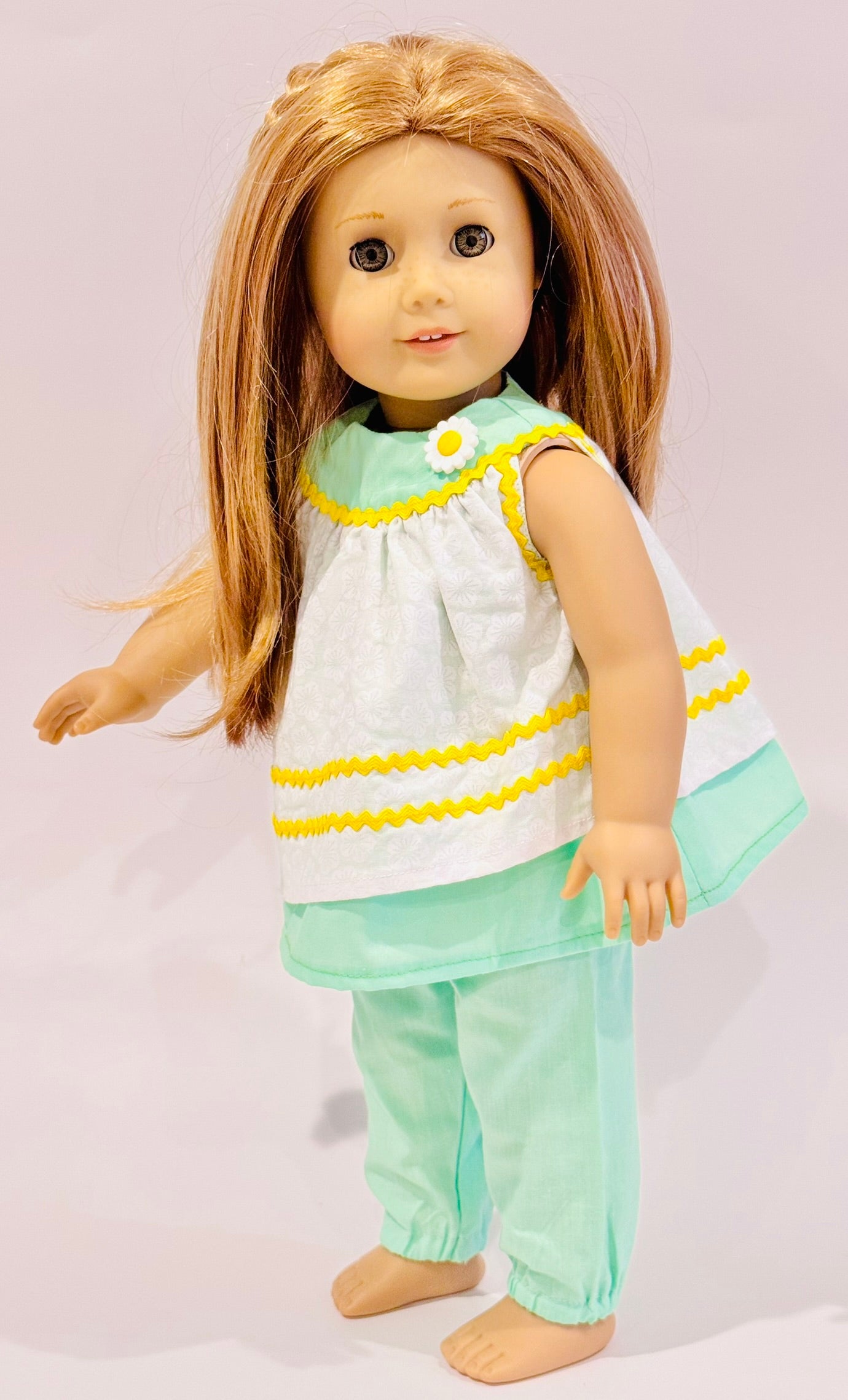 2-piece outfit made by Kathleen Saviak: mint green flowy and flowery top and slacks