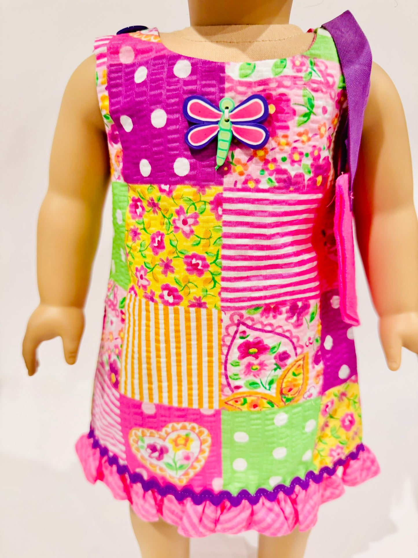 Dress and purse made by Kathleen Saviak: pink dragonfly patchwork quilt