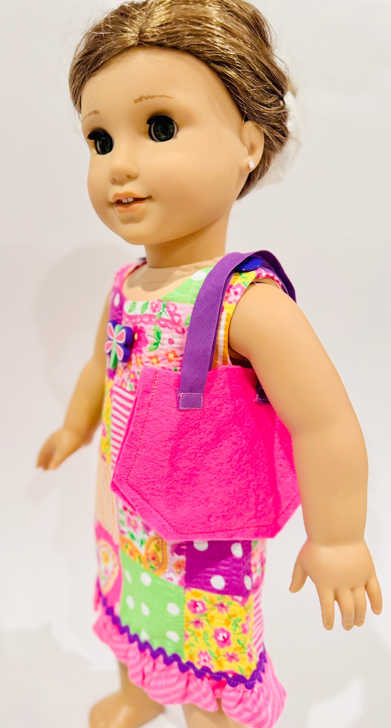 Dress and purse made by Kathleen Saviak: pink dragonfly patchwork quilt