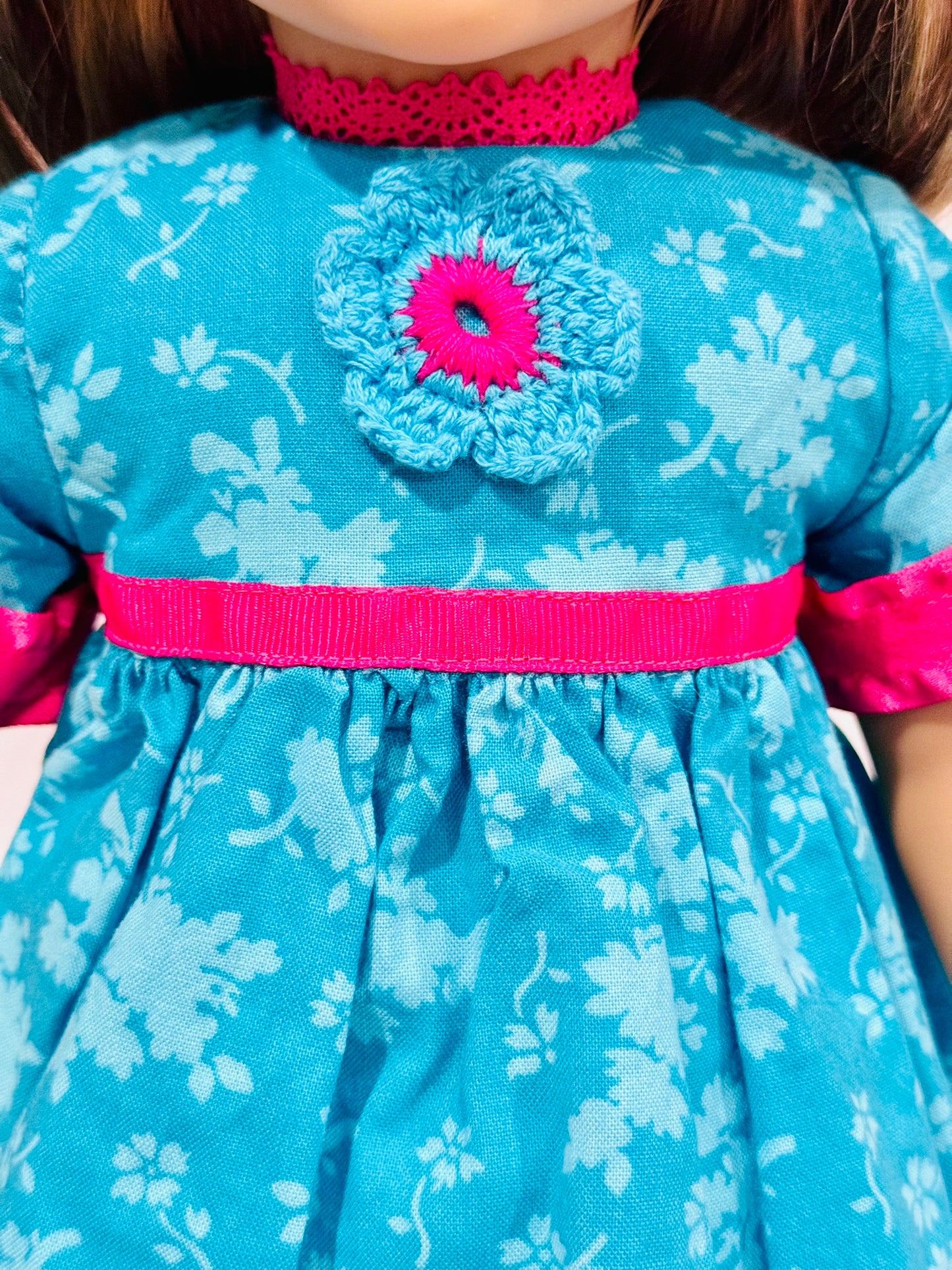 Dress made by Kathleen Saviak: blue and hot pink with crochet flower