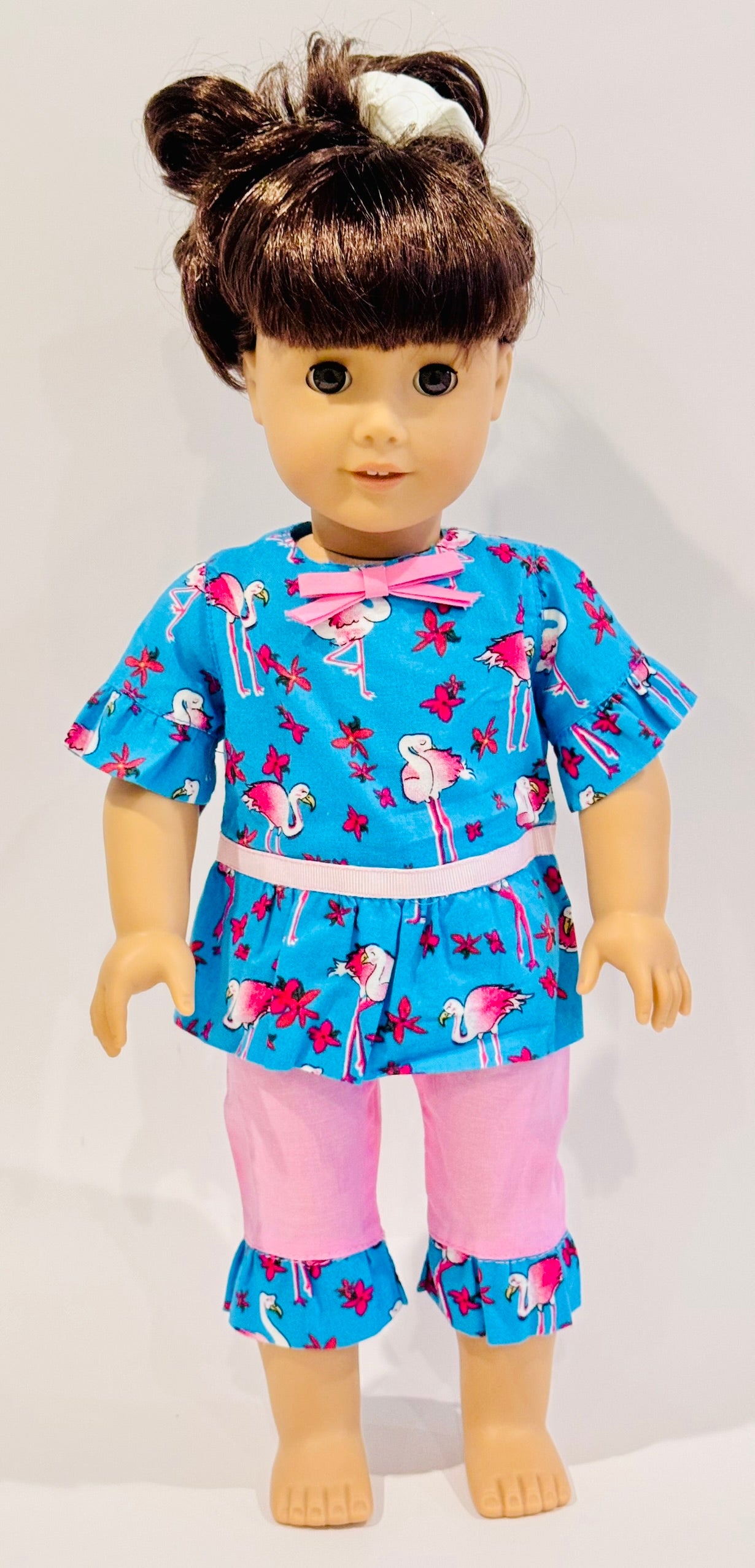2-piece outfit made by Kathleen Saviak: blue and pink flamingo ruffled top and capris