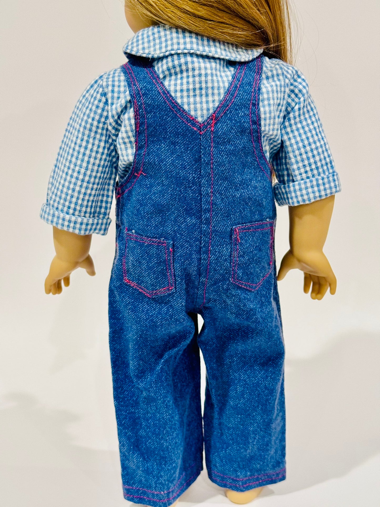 2-piece outfit made by Kathleen Saviak: blue jean overalls with gingham undershirt