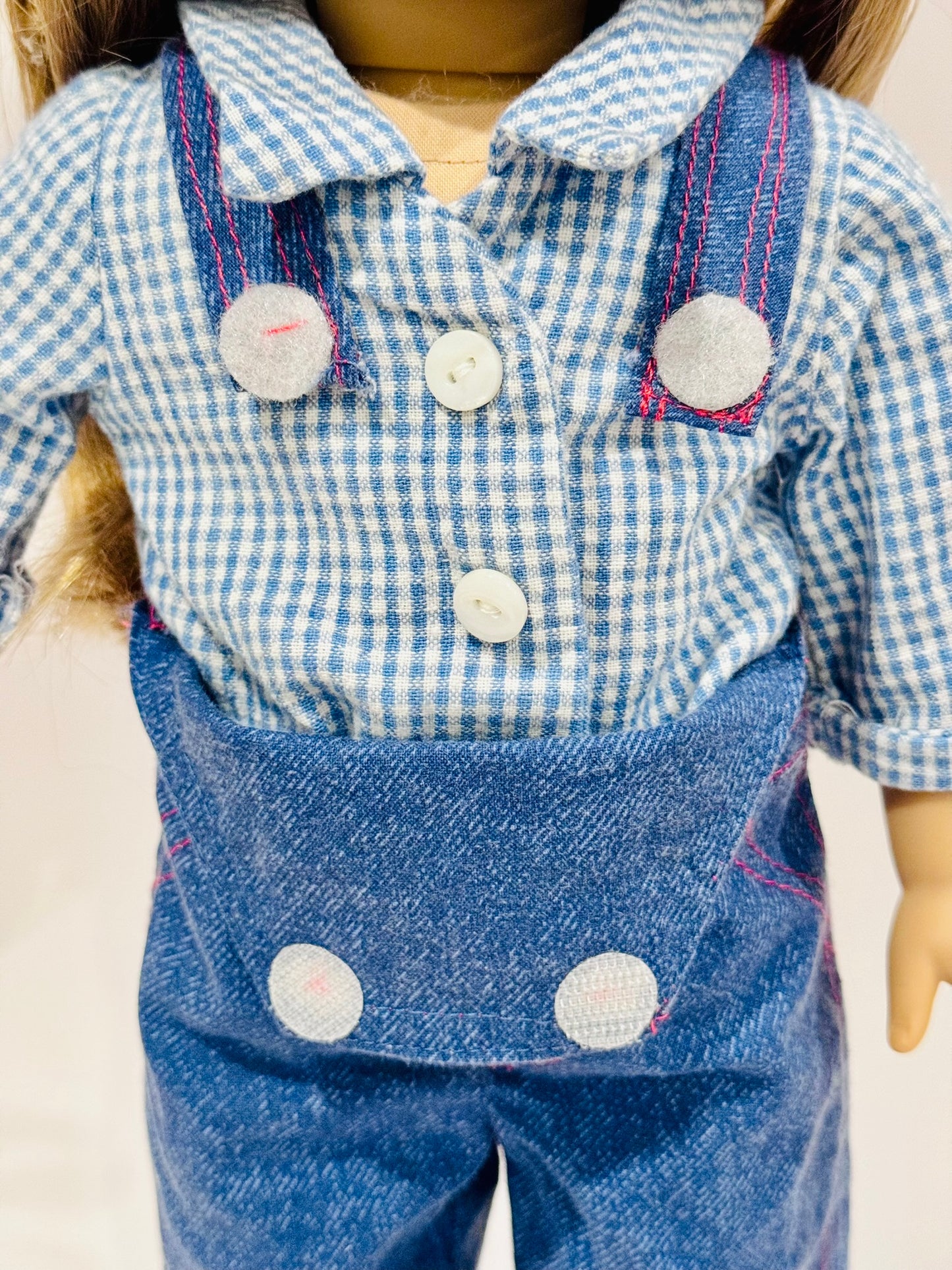 2-piece outfit made by Kathleen Saviak: blue jean overalls with gingham undershirt