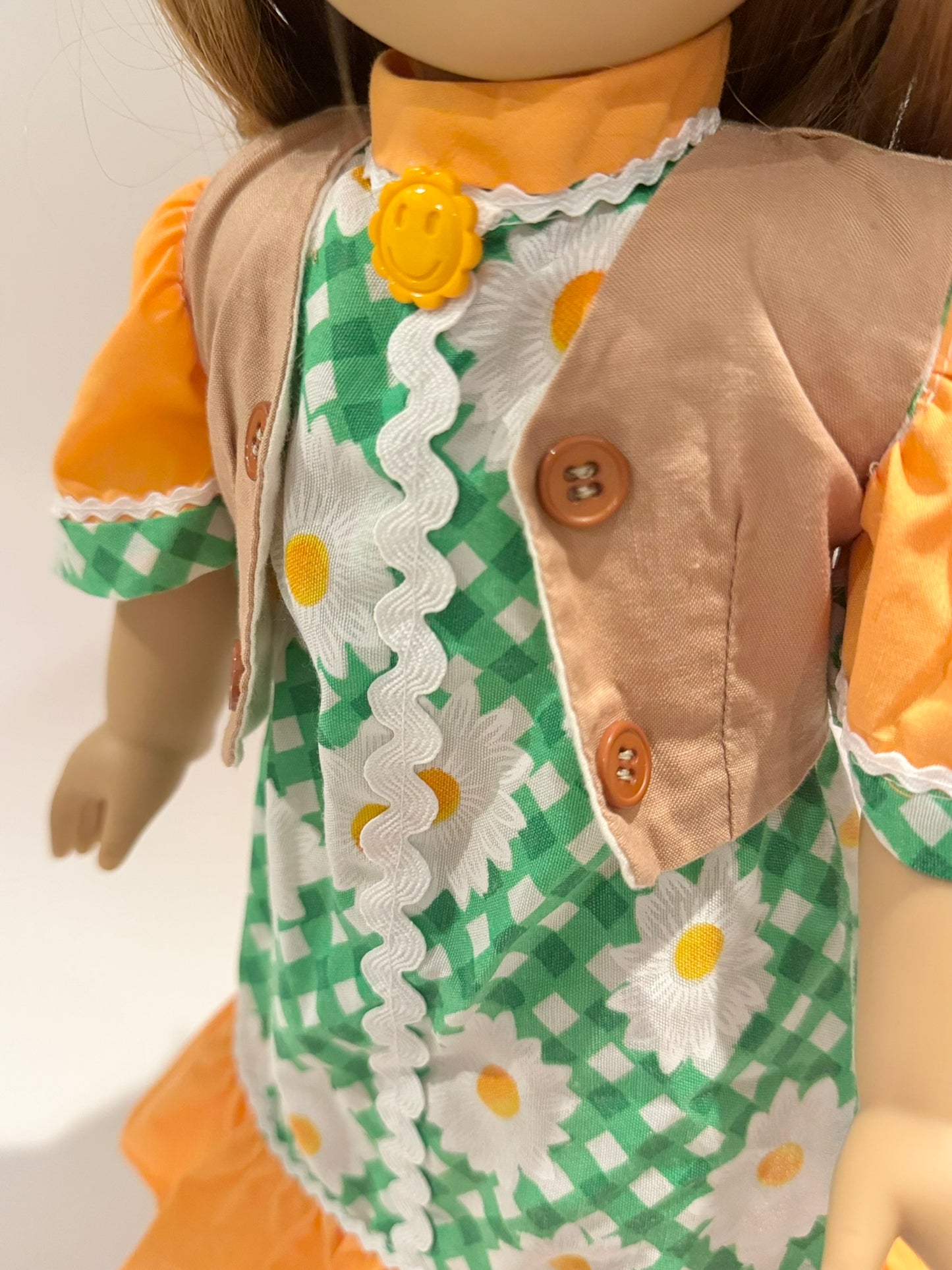3-piece outfit made by Kathleen Saviak: orange and green daisies