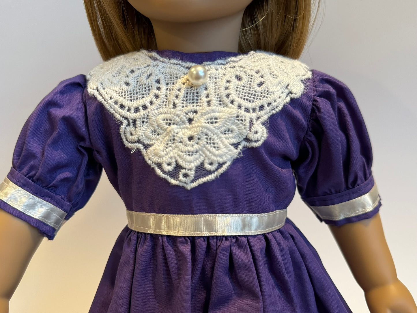 Dress made by Kathleen Saviak: purple with white lace and ribbon accents