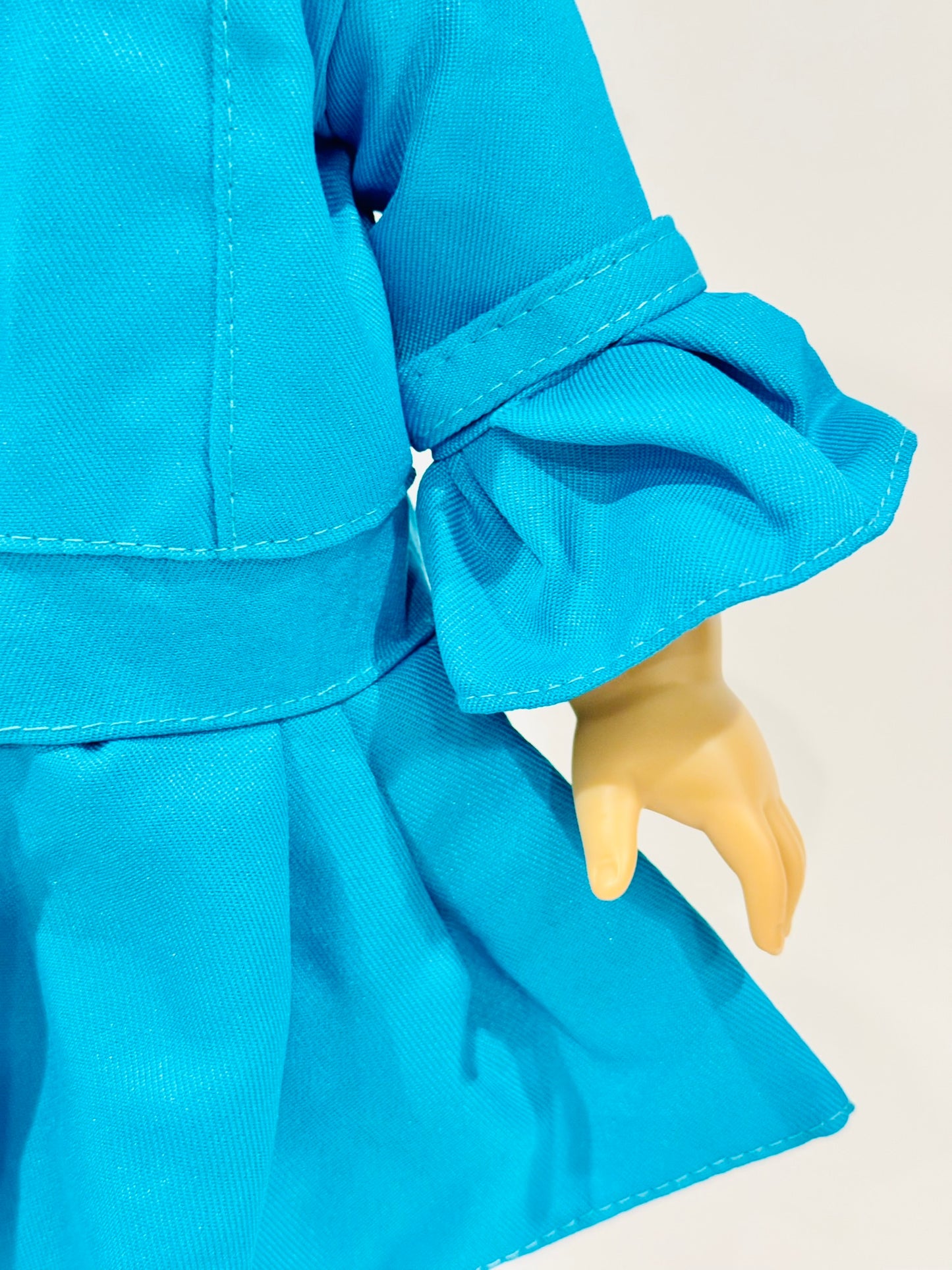 2-piece outfit made by Kathleen Saviak: blue coat and hat