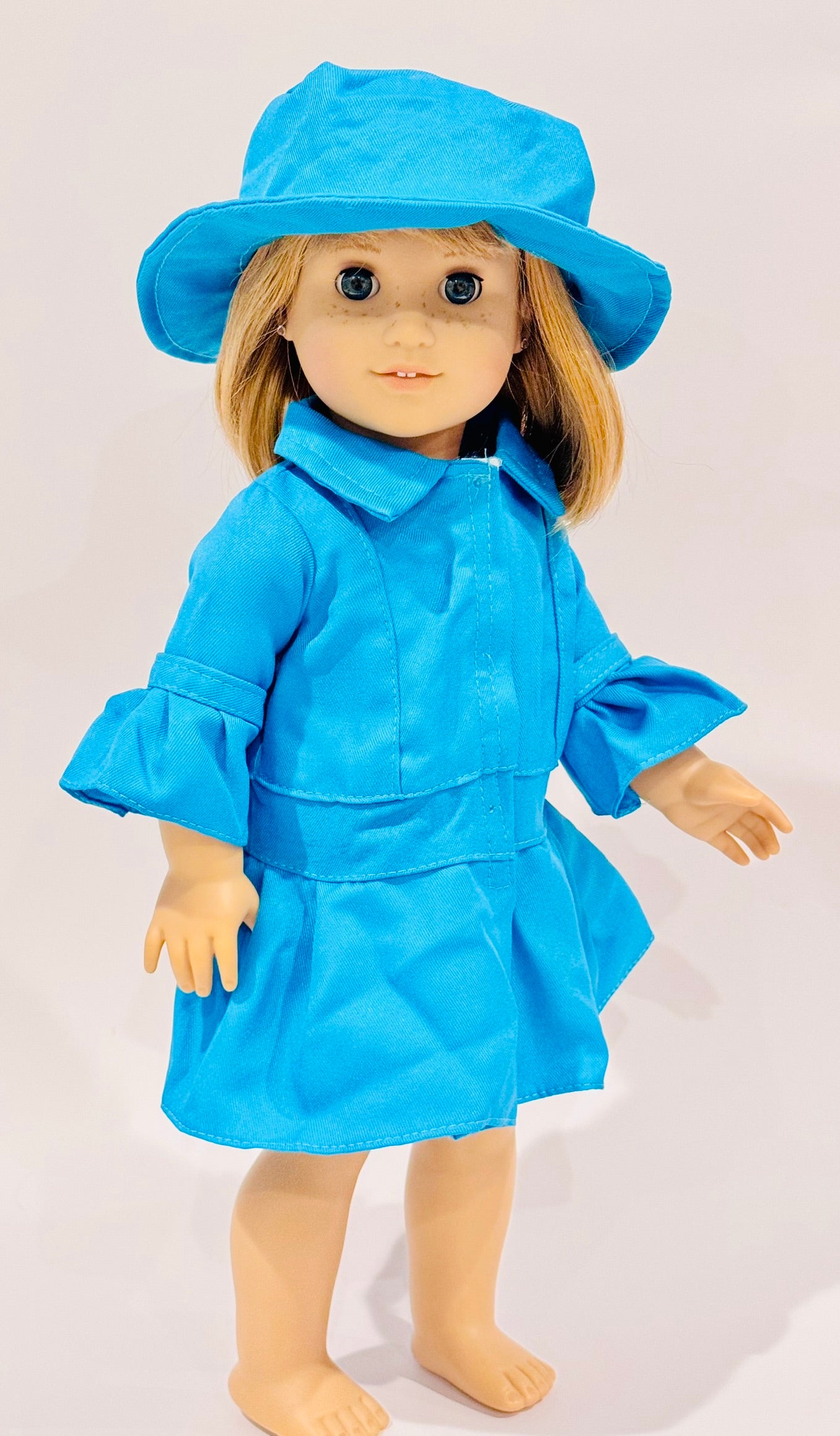 2-piece outfit made by Kathleen Saviak: blue coat and hat