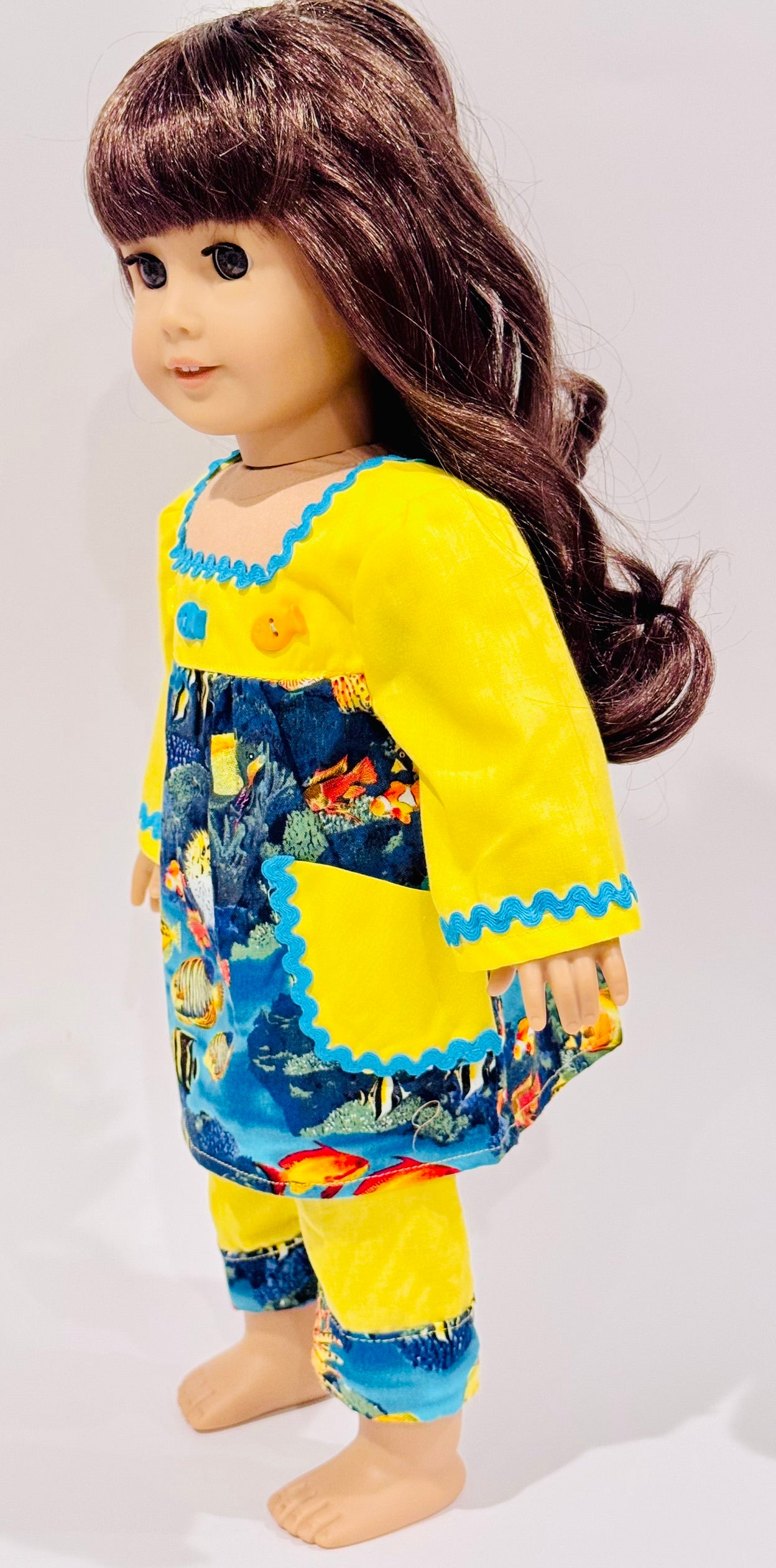 2-piece outfit made by Kathleen Saviak: yellow and blue ocean top and slacks