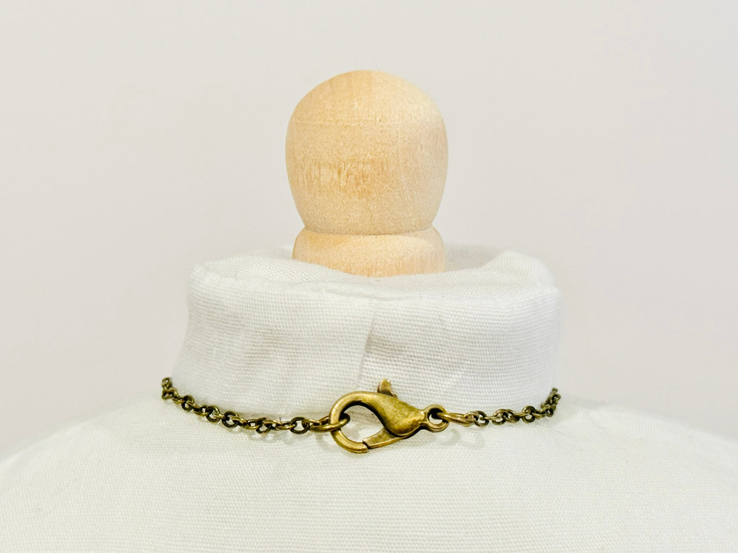 Doll Charm Necklace - Bronze Heart