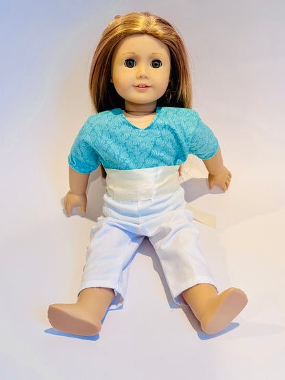 3-piece outfit made by Kathleen Saviak: aqua frill top with white slacks and coordinating ribbon