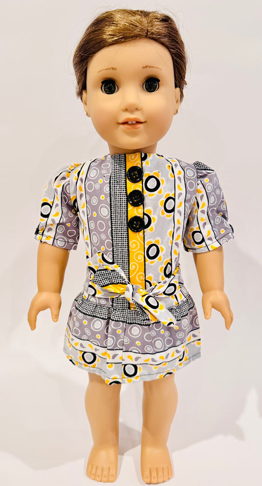 Dress made by Kathleen Saviak: whimsical yellow, gray, black, and white