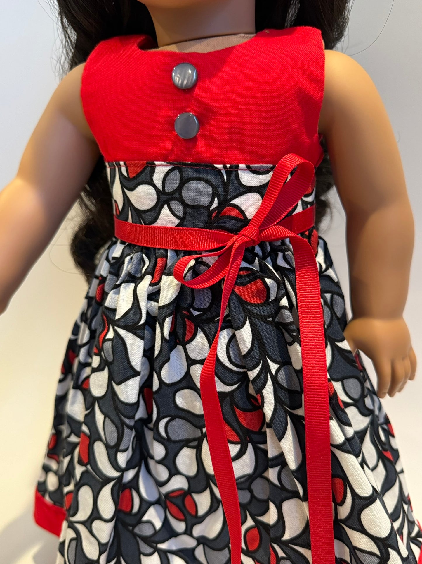 Dress made by Kathleen Saviak: whimsical red, gray, and white sleeveless
