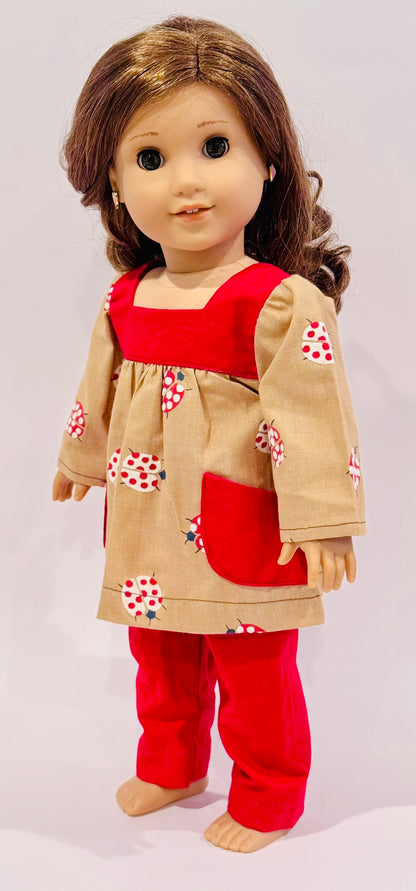 2-piece outfit made by Kathleen Saviak: ladybug top with pockets and red slacks