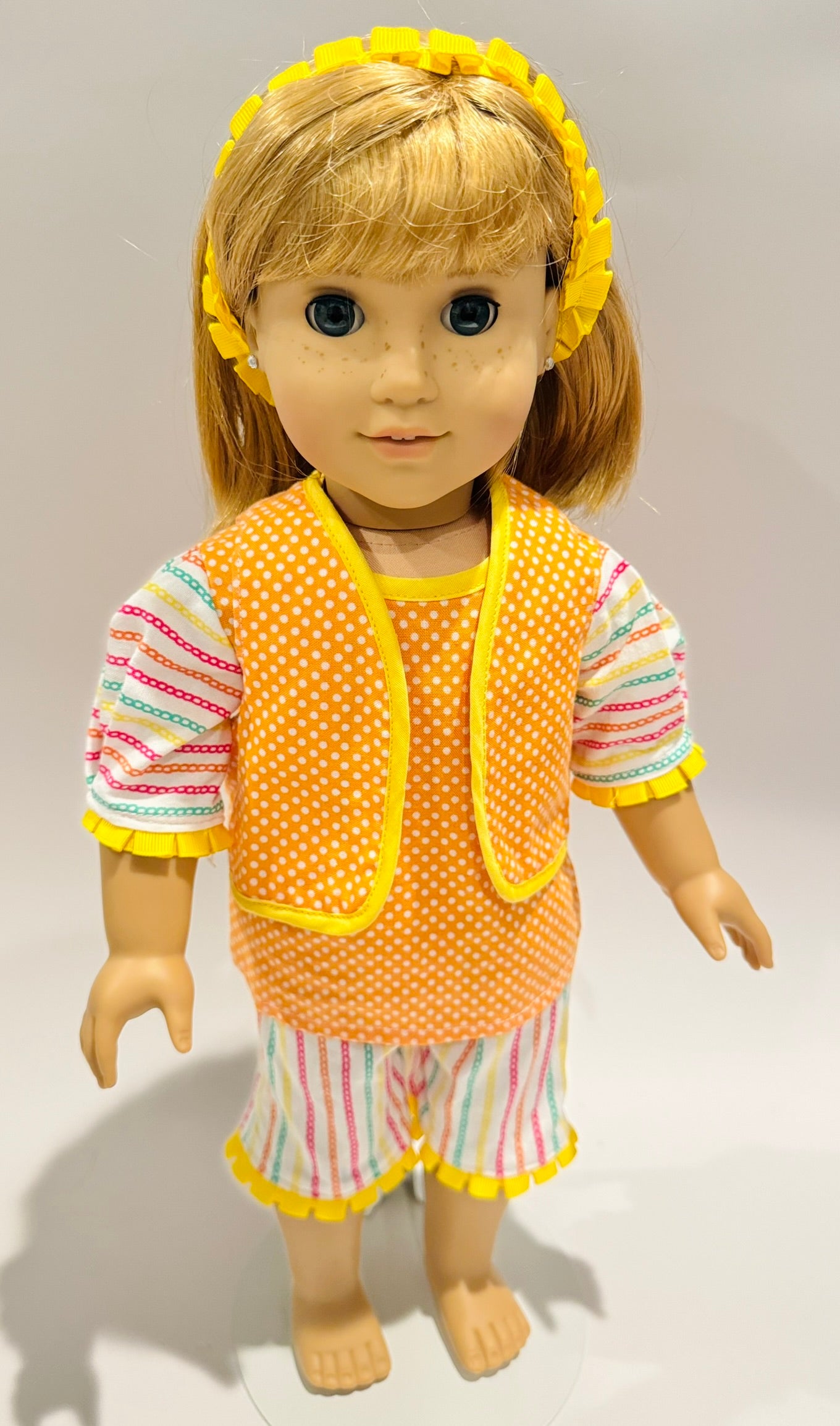 4-piece outfit made by Kathleen Saviak: colorful citrus and pleated ribbon