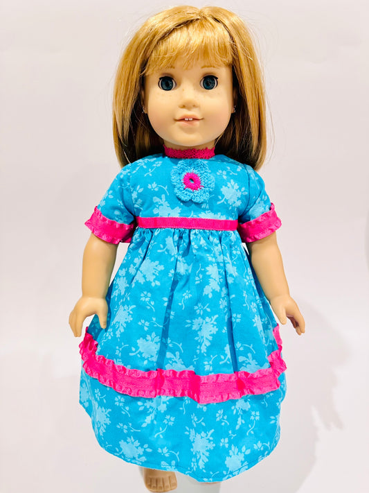 Dress made by Kathleen Saviak: blue and hot pink with crochet flower