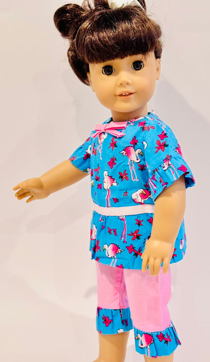 2-piece outfit made by Kathleen Saviak: blue and pink flamingo ruffled top and capris