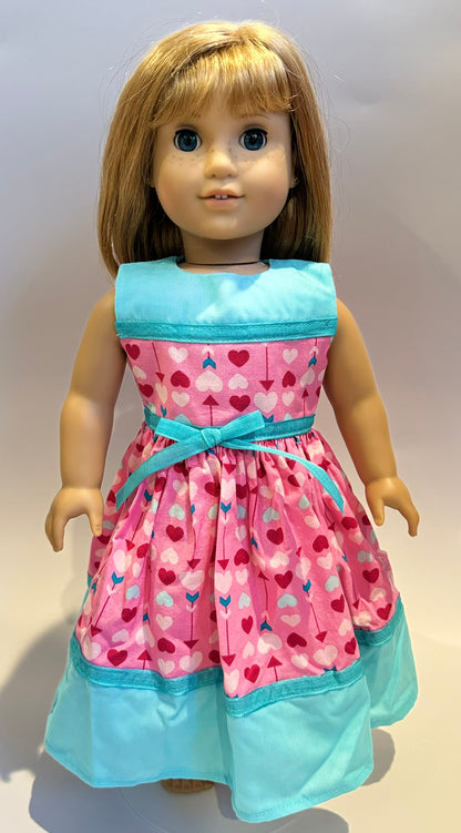 Dress made by Kathleen Saviak: pink Valentine arrows with blue accents