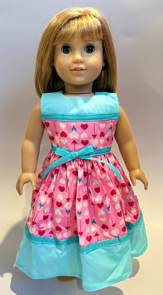 Dress made by Kathleen Saviak: pink Valentine arrows with blue accents