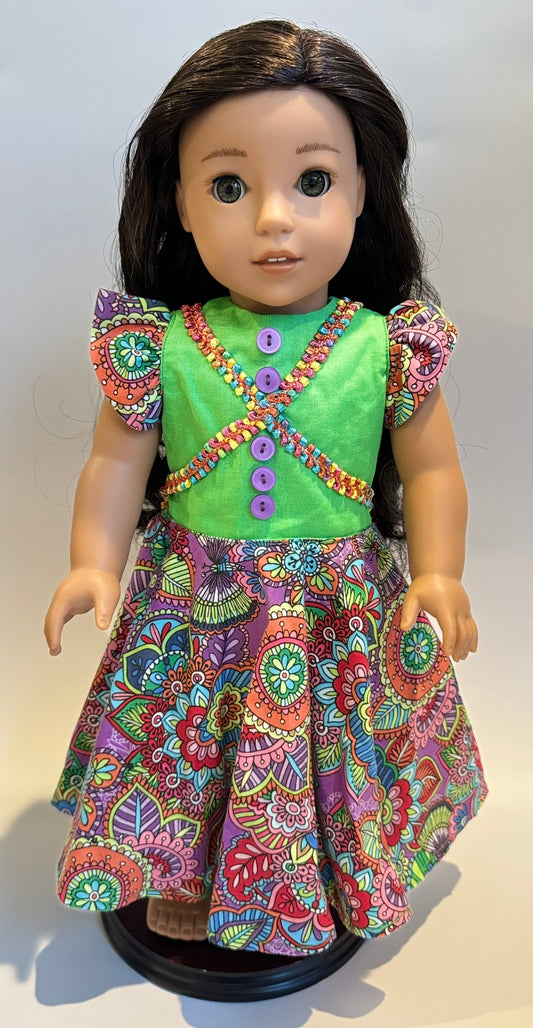 Dress made by Kathleen Saviak: colorful floral with ribbon decoration